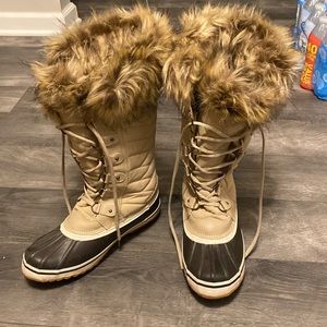 Tan lace up boots, with fur. Super warm. Size 10